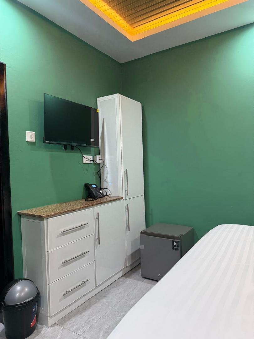 Lodge room with television and built-in storage